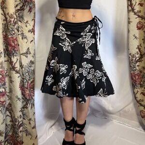 APRIL Stunning Y2k black midi skirt with white butterfly pattern & satin detail